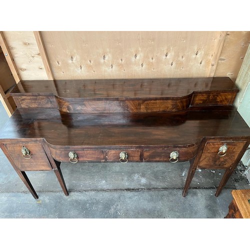 70 - Large Georgian mahogany sideboard; break front and top section, fitted with brass lion head and hoop... 