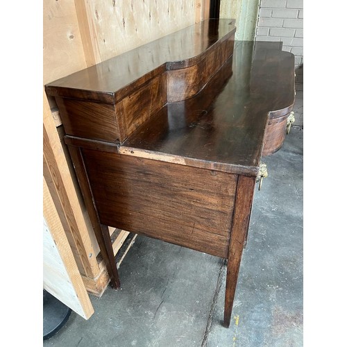 70 - Large Georgian mahogany sideboard; break front and top section, fitted with brass lion head and hoop... 