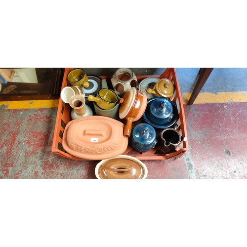 101 - Crate of studio pottery; Terracotta cooking pot, Blue glaze lidded preserve pots and various other i... 