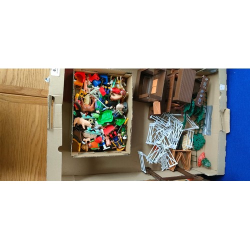 119 - Box of playmobil farm buildings and figures; various vehicle models.