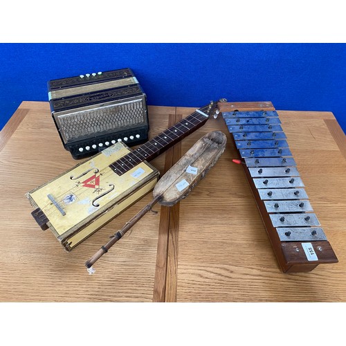 155 - Four musical instruments; Squeeze box, Xylophone and two stringed instruments