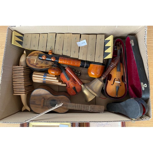 157 - Box of Musical items; Miniature instruments and bells.