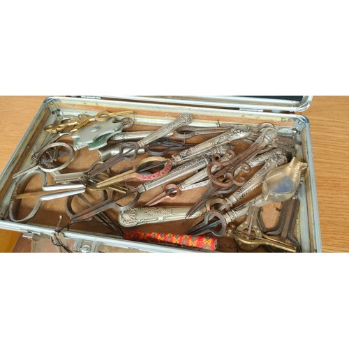 174 - Case of various JAW Harps and wooden box.