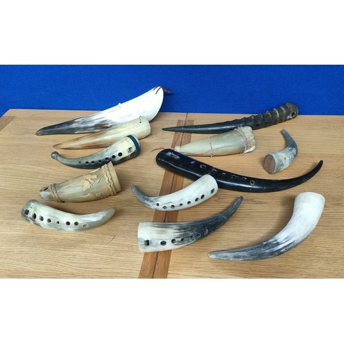 201 - Box of mixed ornate horns and antlers made into musical instruments and drinking horns.