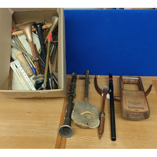 202 - A Box of mixed musical instruments; Tortoise shell stringed instrument, Flute and recorders