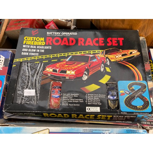 336 - Four vintage racing car sets; Artin- Spiral Tier racing set Custom Firebird racing set