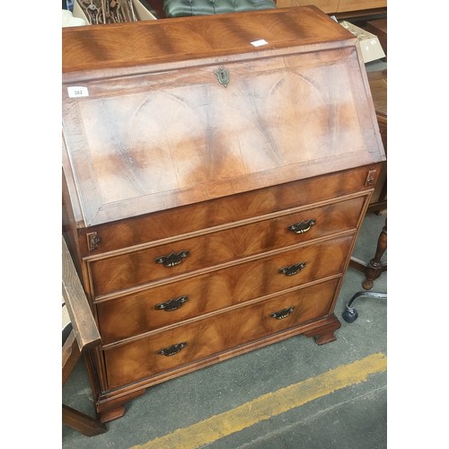 382 - Antique mahogany three drawer writing bureau; lift down front revealing green leather writing area, ... 