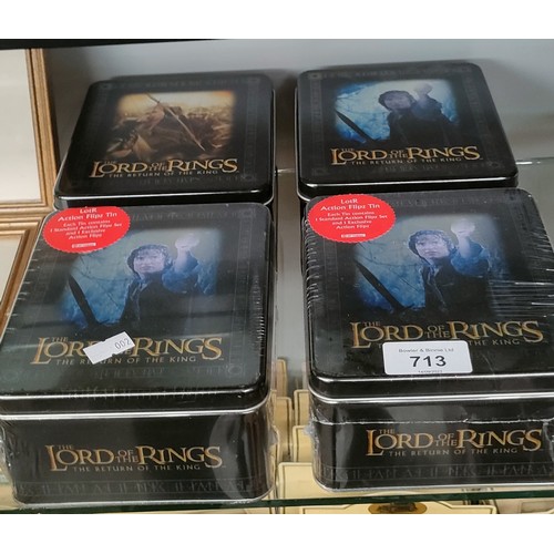 713 - Four boxes of Lord of the Rings trading cards