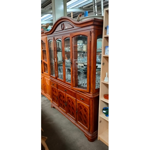 763 - A large livingroom display cabinet set in oak