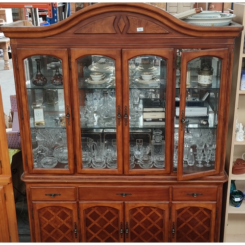 763 - A large livingroom display cabinet set in oak