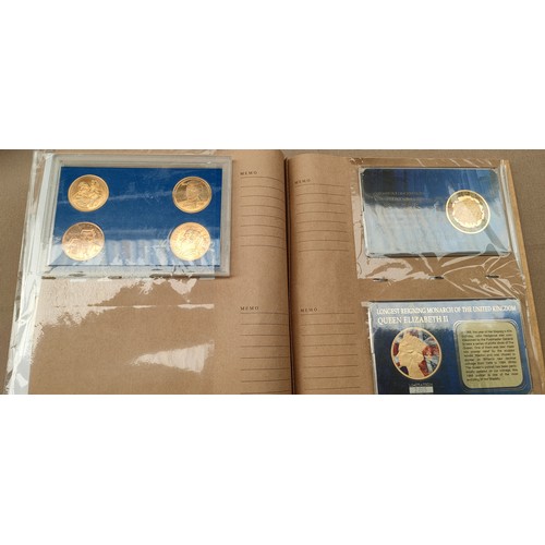 759 - Album of The Royal Family commemorative Cards covers and coins.