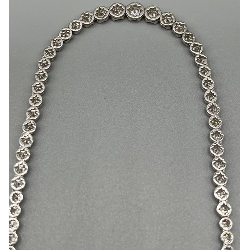 1194 - 18ct white gold and 7cts Brilliant Cut Diamond line Necklace. [43cm in length] [22.51grams] Original... 