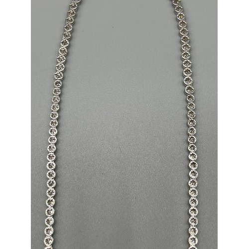 1194 - 18ct white gold and 7cts Brilliant Cut Diamond line Necklace. [43cm in length] [22.51grams] Original... 