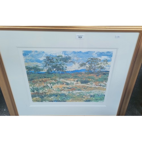 904 - Rolf Harris 
Limited edition print depicting landscape Signed and limited 148/695. Fitted within a g... 