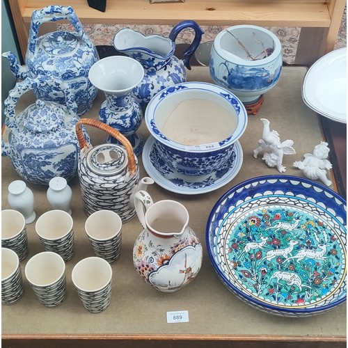 888 - A Collection of porcelain collectables; Chinese blue and white planter, Blue and white tea pots, Fis... 