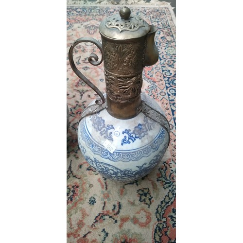 855 - Two Chinese blue and white and metal worked vessel pots with lids.