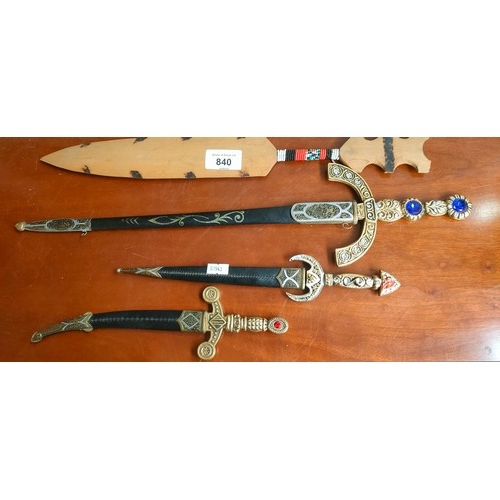 840 - Three replica dagger letter openers with sheaths and African tribal wooden dagger