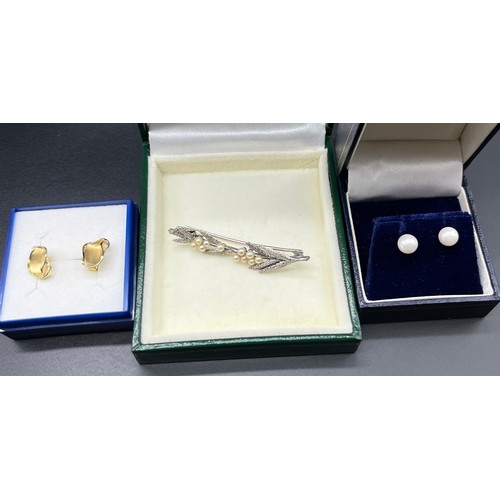 1167 - 9ct white gold and pearl fern style brooch, 9ct and pearl stud earrings and a pair of 14ct yellow go... 