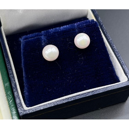 1167 - 9ct white gold and pearl fern style brooch, 9ct and pearl stud earrings and a pair of 14ct yellow go... 