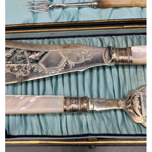 1172 - Antique boxed set of E.P Serving knife and fork with Sheffield silver collars and Mother of pearl ha... 