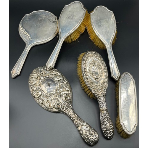 1186 - A Selection of silver hand brushes and mirror.