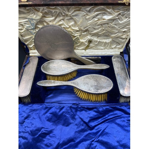 1192 - Boxed Birmingham silver dressing table hand brushes and hand mirror.