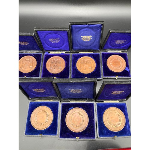 1217 - Selection of boxed Bronze presentation medallions, Silver Technological Examination 1st prize medall... 