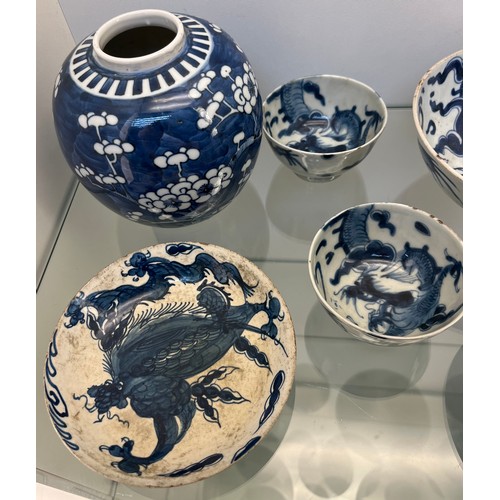 1229 - Selection of Antique Chinese blue and white dragon design cups and saucers, matching bowl, one other... 