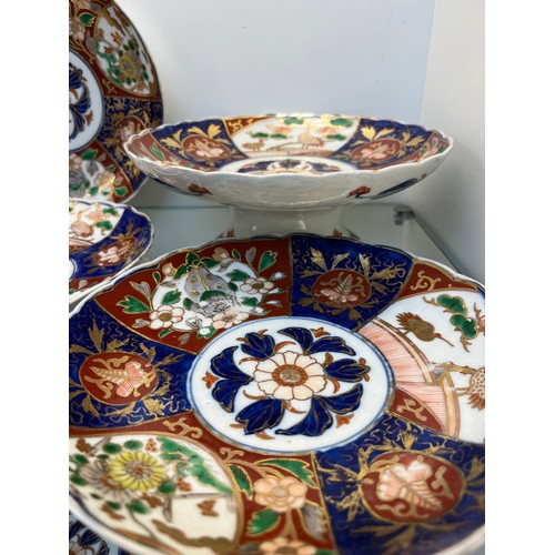 1230 - A Set of eight Chinese hand painted plates and two tazza comports. [Some have damage to rims- ask fo... 