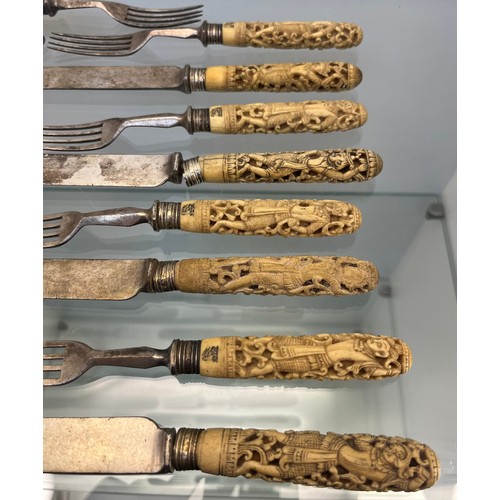 1231 - Antique Asian themed bone carved handled forks and knives.