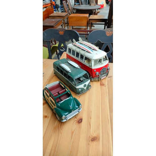 957 - Two Tin plate VW Camper vans and one other