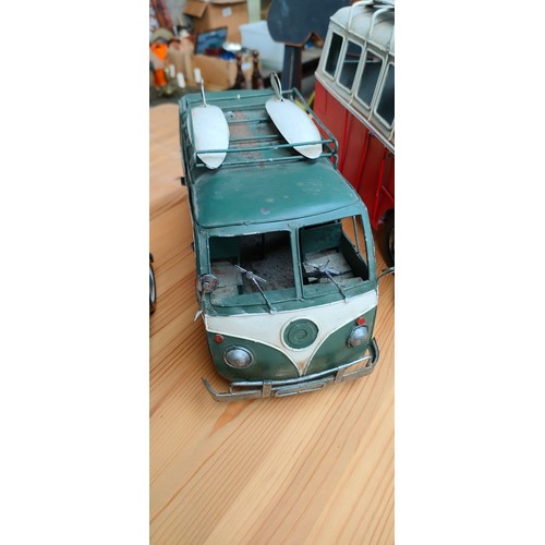 957 - Two Tin plate VW Camper vans and one other