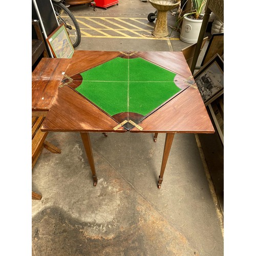 969 - 19th century fold out games table, Single Frieze drawer, square tapered legs and finished on ceramic... 