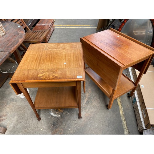 970 - Edwardian inlaid floral design drop end side table of two tiers. Together with a light wood trolley ... 