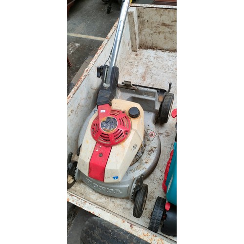 1008 - Honda petrol lawn mower and Bosch Alr 900mower