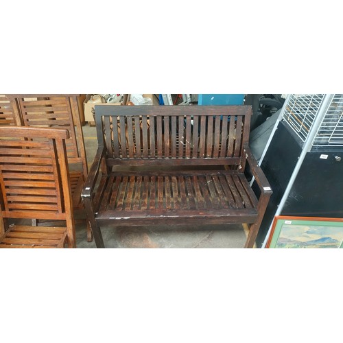 1022 - Dark stained garden bench