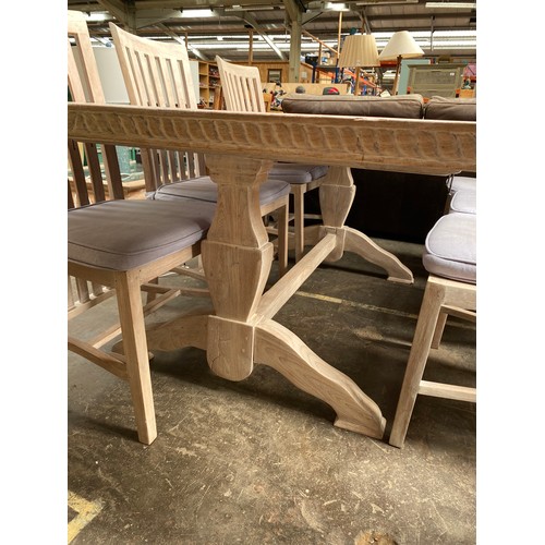 978 - Contemporary white washed dining table and six matching chairs (damage to the base)