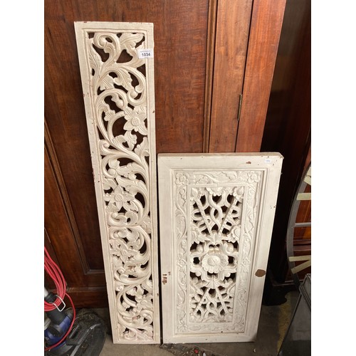 1034 - Two white painted carved wooden panels