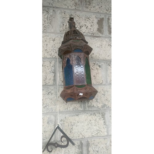 1064 - Indian metal worked and stainglass lantern