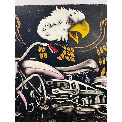 1385 - Large Vintage hand painted Carnival board; depicting Eagle and motorcycle. [122x203cm]