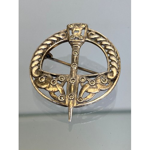 737A - Four silver Brooches; Birmingham silver ornate Celtic design plaid brooch, Silver thistle design bro... 