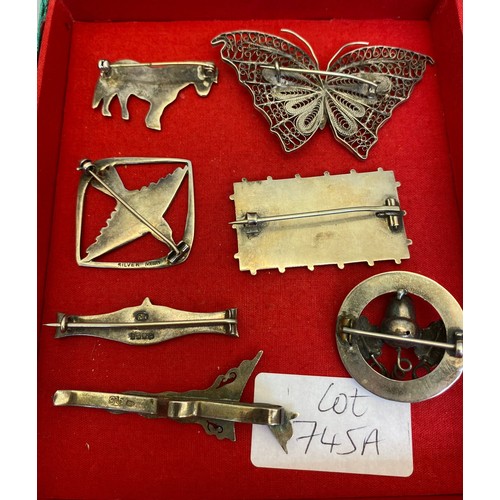 745A - Selection of Silver brooches; 925 Kris dagger tie clip, Victorian silver rectangle floral design bro... 