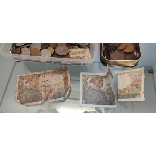 753A - A Collection of mixed world coins and banknotes.