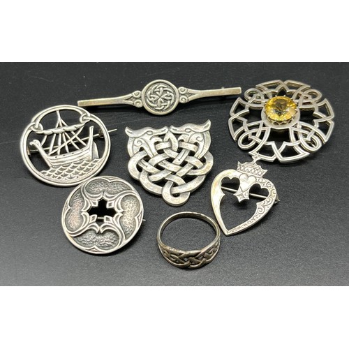 1151 - A Selection of Celtic design brooches; Iona Silver Celtic design brooch with citrine stone produced ... 