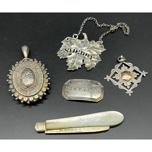 1152 - Various silver items; Large Victorian Sterling silver ornate locket pendant, Chester silver fob meda... 