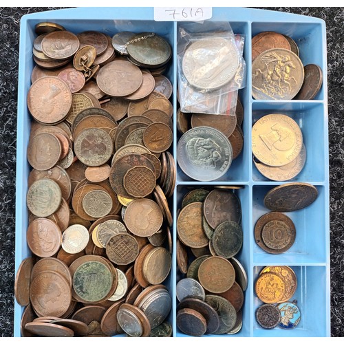 761A - A Tray containing a large quantity of mixed world coins.