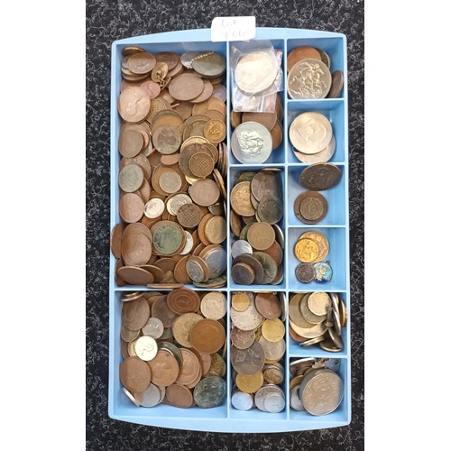 761A - A Tray containing a large quantity of mixed world coins.