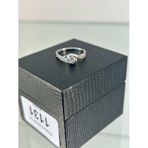 1131 - 9ct white gold and diamond ladies ring. 0.33cts diamonds. [Ring size O] [2.45Grams]