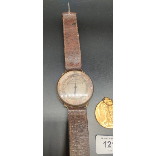 1215 - A Rare Aero Altimeter Compensated wrist piece with leather straps. Possibly WWI OR II. Together with... 