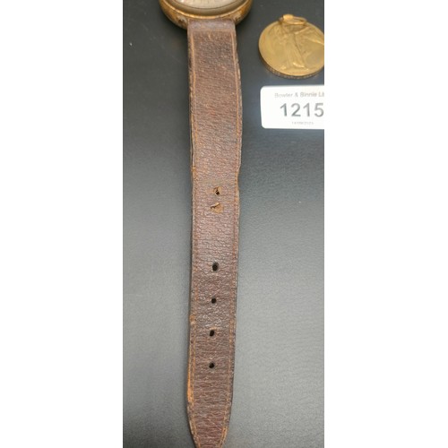 1215 - A Rare Aero Altimeter Compensated wrist piece with leather straps. Possibly WWI OR II. Together with... 